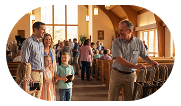 Growing Church with Usher adding more seats while a family waits. 